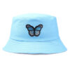 Bob-papillon-brodé-couleur-bleu-clair-sur-un-fond-blanc