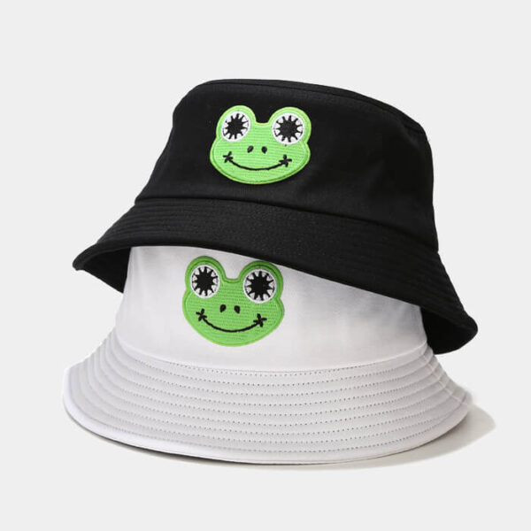 Bob-rainette-joyeuse-noir-chevauche-un-bob-grenouille-blanc