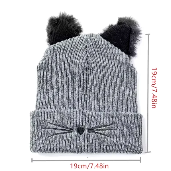 Les dimensions d'un bonnet doux gris sont indiquées