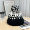 bonnet-pompon-femme-noir