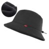 Le bob chapeau de golf de couleur noire en version hiver avec revêtement intérieur polaire est présenté sur un fond blanc